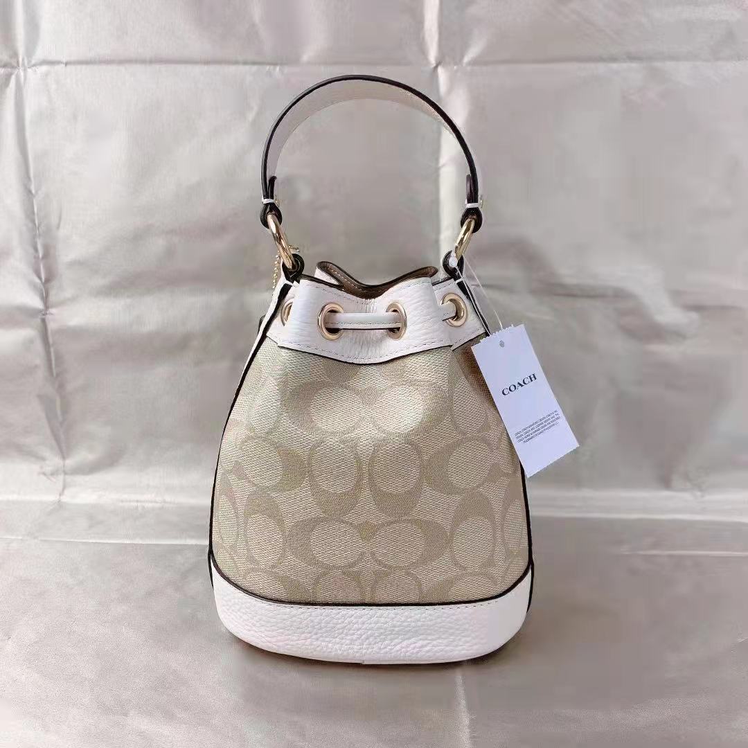 Coach C5121 Dempsey Drawstring Bucket 15 In Signature Canvas In Light Khaki Chalk Coach C5121 Dempsey Drawstring Bucket 15 In Signature Canvas In Light Khaki Chalk